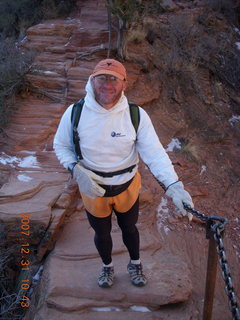 Zion National Park - sunrise Angels Landing hike - Adam climbing down chains