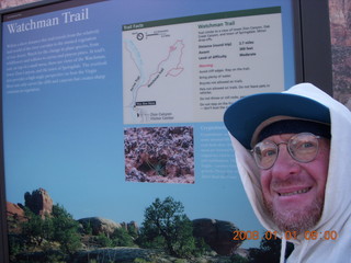 51 6d1. Zion National Park - sunrise Watchman hike - sign and Adam in hood