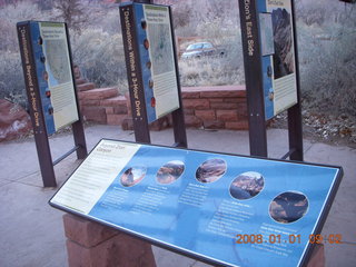 57 6d1. Zion National Park - visitor's center signs