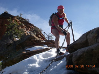 71 6eu. Zion National Park - Angels Landing hike - Adam coming down the icy part