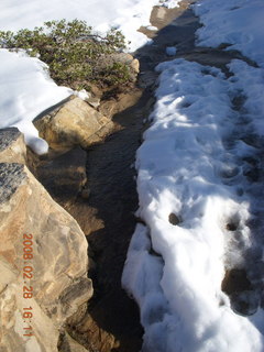 133 6eu. Zion National Park - west rim hike - snowy wet footpath