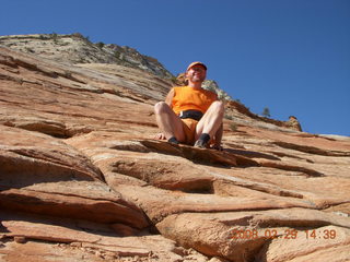 105 6ev. Zion National Park - slickrock hill - Adam sitting