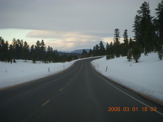 404 6f1. Bryce Canyon - road going north with snow and clouds