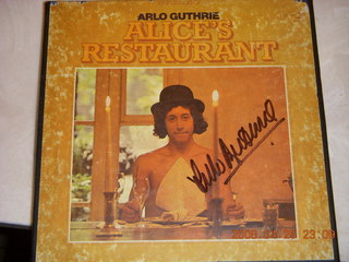 Arlo Guthrie milling around