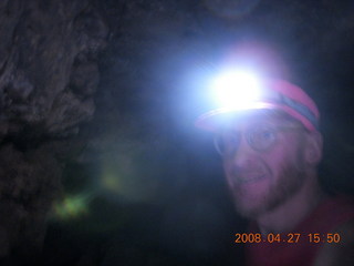 309 6gt. Snow Canyon - Lava Flow cave - Adam with headlamp