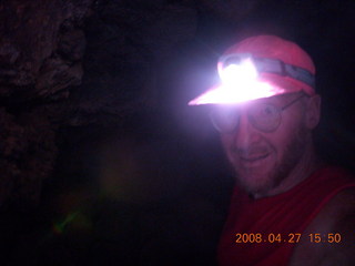 310 6gt. Snow Canyon - Lava Flow cave - Adam with headlamp