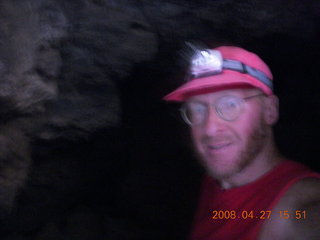 311 6gt. Snow Canyon - Lava Flow cave - Adam with headlamp