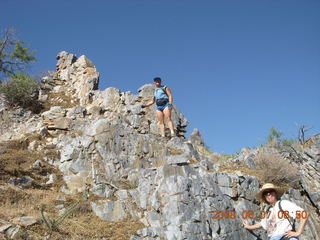 852 6j7. Windgate hike - Adam atop big rock with Michael below