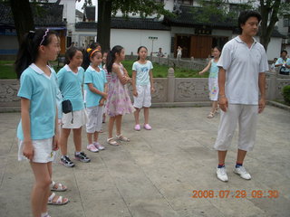 eclipse - Shanghai - Zhu Jia Jiao village - girls joining us for Tai Chi