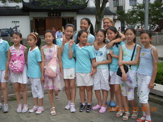 61 6kv. eclipse - Shanghai - Zhu Jia Jiao village - girls joining us for Tai Chi and Wendy