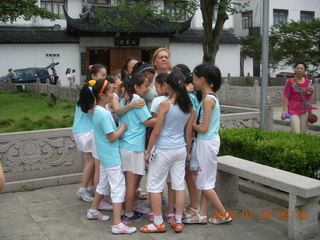 63 6kv. eclipse - Shanghai - Zhu Jia Jiao village - girls joining us for Tai Chi and Wendy