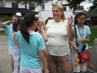 64 6kv. eclipse - Shanghai - Zhu Jia Jiao village - girls joining us for Tai Chi and Wendy