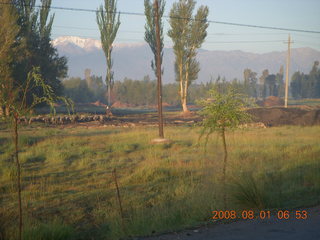 23 6l1. eclipse - Jiuquan morning run - trees and mountains