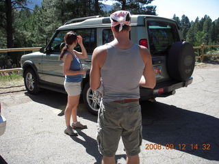 Dustin carrying Adam across river - hiking at Pine Valley, Utah