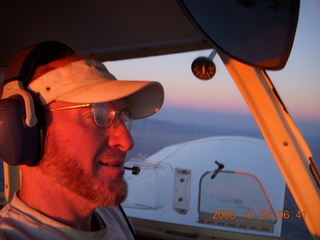 Adam flying N4372J at sunrise