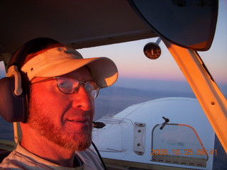 6 6nr. Adam flying N4372J at sunrise