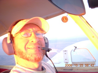 Adam flying N4372J