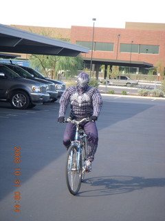 Adam as Spiderman on Halloween riding bike