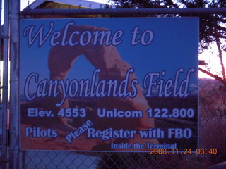pre-dawn Canyonlands Airport (CNY) sign
