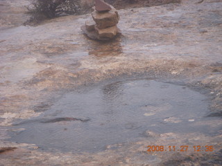 280 6pt. Canyonlands National Park - Lathrop trail hike - raindrops on pothole puddle