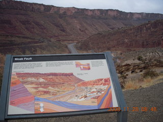 24 6pu. Moab Fault sign seen from road in Arches National Park