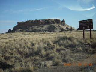 111 6pu. Canyonlands National Park butte with Lathrop sign