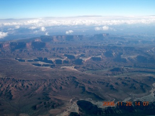 130 6pu. aerial - Canyonlands area with puffy clouds