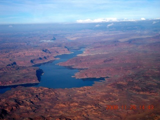 aerial Lake Powell distant mountains and clouds