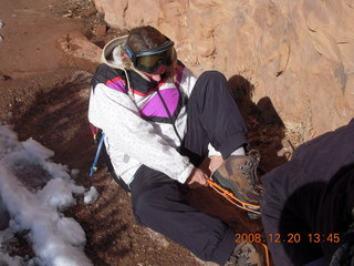 Zion National Park - Angels Landing hike - Debbie putting on crampon