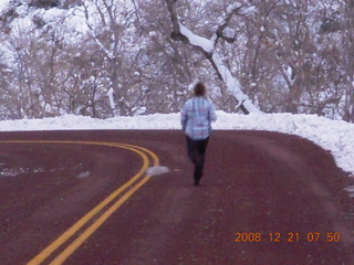 42 6qm. Zion National Park - Debbie on road