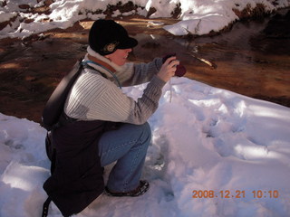 82 6qm. Zion National Park - Emerald Pools hike - Beth taking a picture