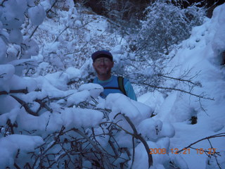 98 6qm. Zion National Park - Emerald Pools hike - Adam through snowy tree
