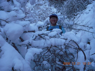 99 6qm. Zion National Park - Emerald Pools hike - Adam through snowy tree