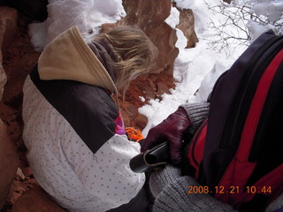 125 6qm. Zion National Park - Emerald Pools hike - Debbie fixing a crampon - Leatherman Supertool 2000 to the rescue