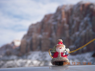 190 6qm. drive from zion to saint george - Christmas ornament we found and blurry scenery