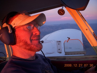 Adam flying N4372J at sunrise