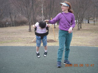 Cecelia and Betsy at the swings