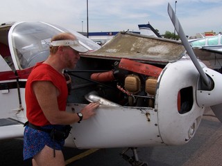 Adam checking N4372J oil - Ken's picture