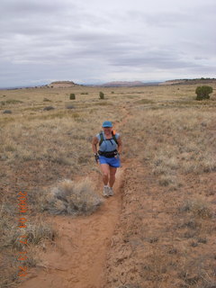 Canyonlands - Lathrop trail hike - Adam running - grassy run at end