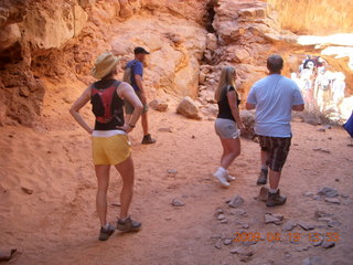 57 6uk. Arches National Park - hikers - Fiery Furnace hike