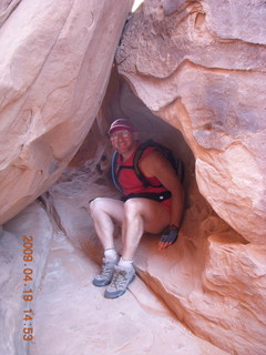 Arches National Park - Fiery Furnace hike - Adam in a hole in the rock