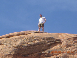 88 6ul. Arches National Park - Devil's Garden hike - two fellows atop Double-O Arch