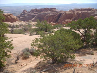 Arches National Park - Devil's Garden hike - two fellows atop Double-O Arch