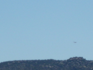 11 6un. Charles Lawrence photo - Charles and Adam landing N4372J at Fry Canyon - in-flight photo