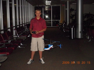 Chance Lawrie and RC helicopter at EAA meeting (1-480-528-0542)