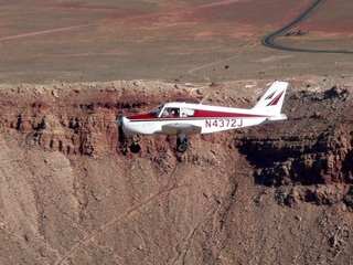 Markus's photo - aerial - Adam flying N4372J - in-flight photo at meteor crater