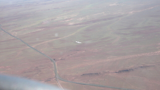 76 6ww. Markus's photo - meteor crater and N4372J in-flight photo