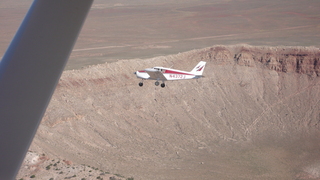 82 6ww. Markus's photo - meteor crater and N4372J in-flight photo