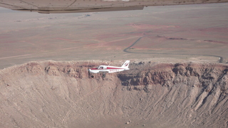 83 6ww. Markus's photo - meteor crater and N4372J in-flight photo