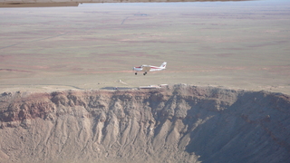 85 6ww. Markus's photo - meteor crater and N4372J in-flight photo